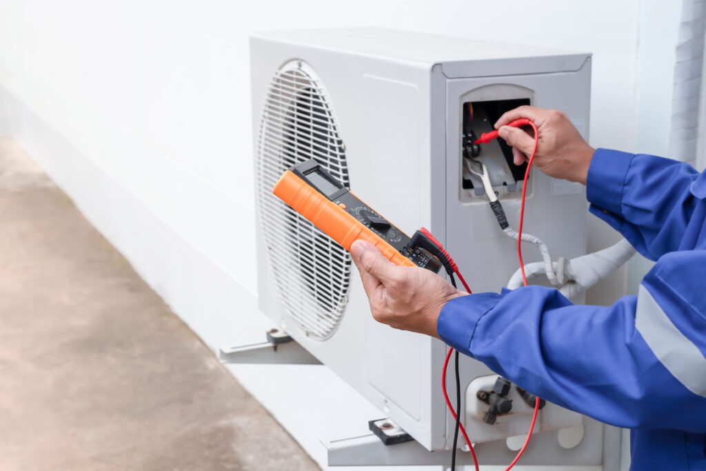Technician Servicing an Air Conditioning System